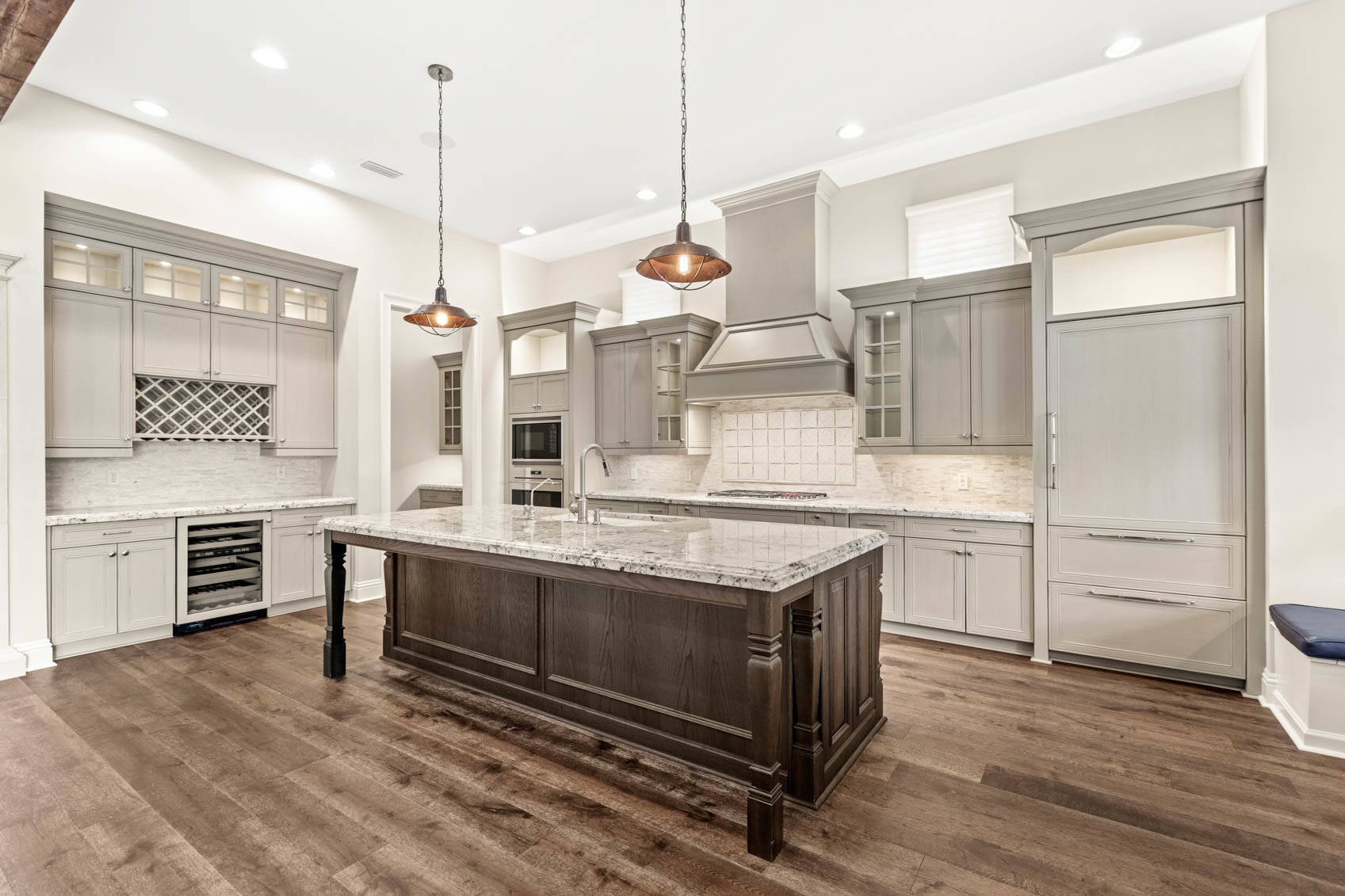 kitchen with white cabinets and brown wood